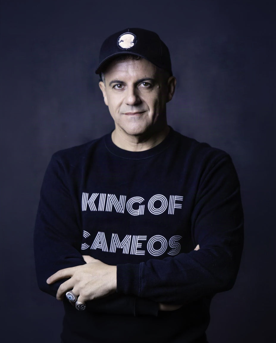 Amedeo Scognamiglio in his signature ''King of Cameos'' sweater and baseball cap with embroidered cameo of a Roman Emperor